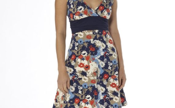 close up of a model wearing a floral dress made of technical fabric