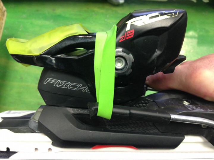 Banding ski binding brakes