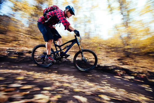 A rider goes fast on the Armstrong Trail