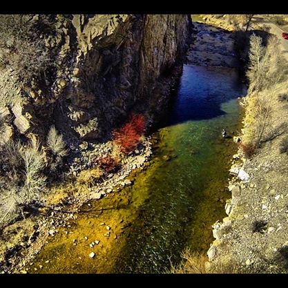 RC helicopter flying in a slot canyon