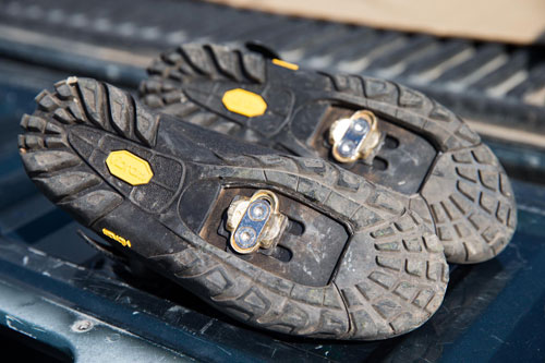 bottom of the shoes showing the cleats