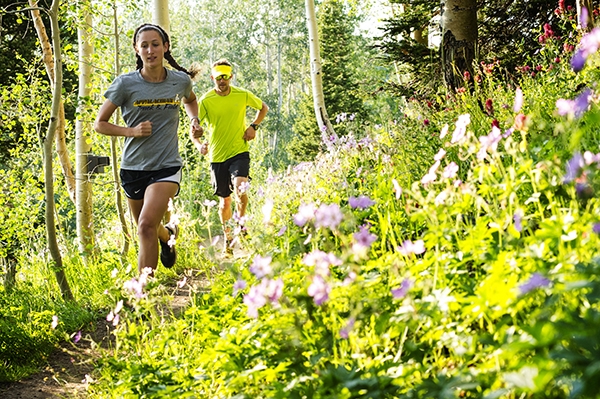 Two runners on a trail