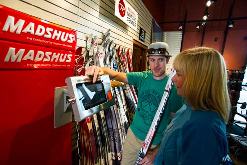 sales associate helps a customer