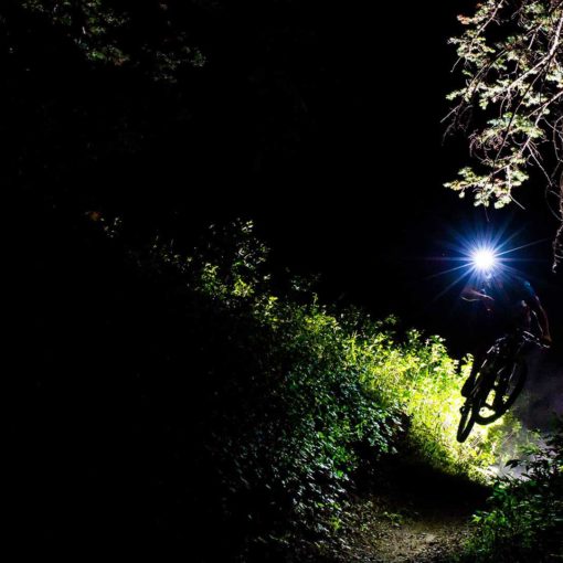 Mountain biking at night with a headlamp
