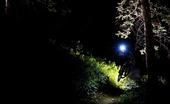 Mountain biking at night with a headlamp