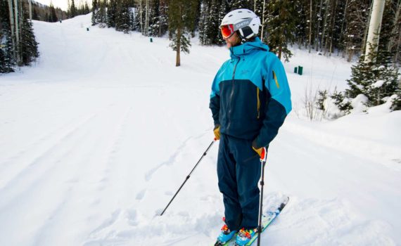Skier standing at the bottom of a chairlift
