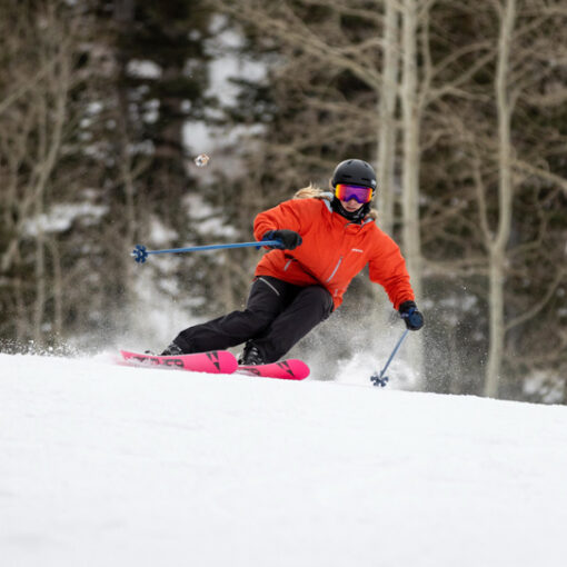 An alpine skier carves a turn on a groomer at Deer Valley Resort in Utah