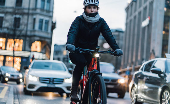Woman riding a Specialized Turbo Vedo bike