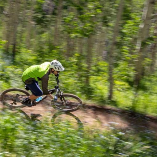Jans employee, Paul Boyle, mountain bikes in Park City, UT.