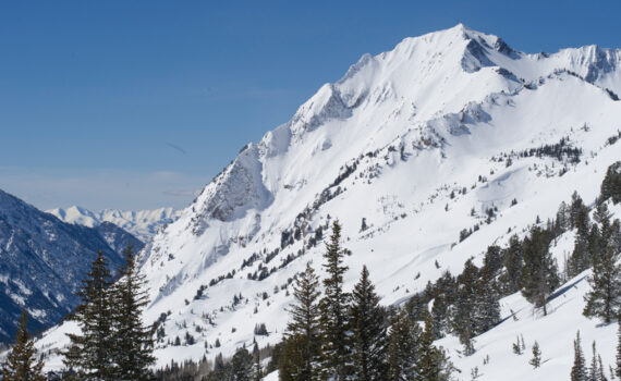 The south face of Mt. Superior in Little Cottonwood Canyon overlooking the Salt Lake valley on a sunny day.