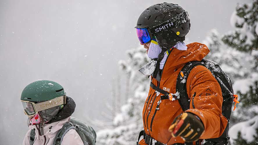 0I0A2229_888x500 Jans Experts pick their line as the snow falls down on their Smith integrated helmet and goggles.
