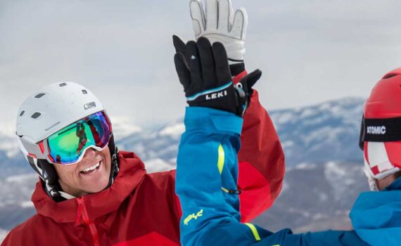 Jans Experts high-five after an amazing ski run at Deer Valley Resort.