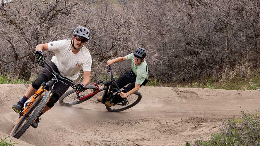 Jans Experts cruise through a berm in Salt Lake City's I-street bike park