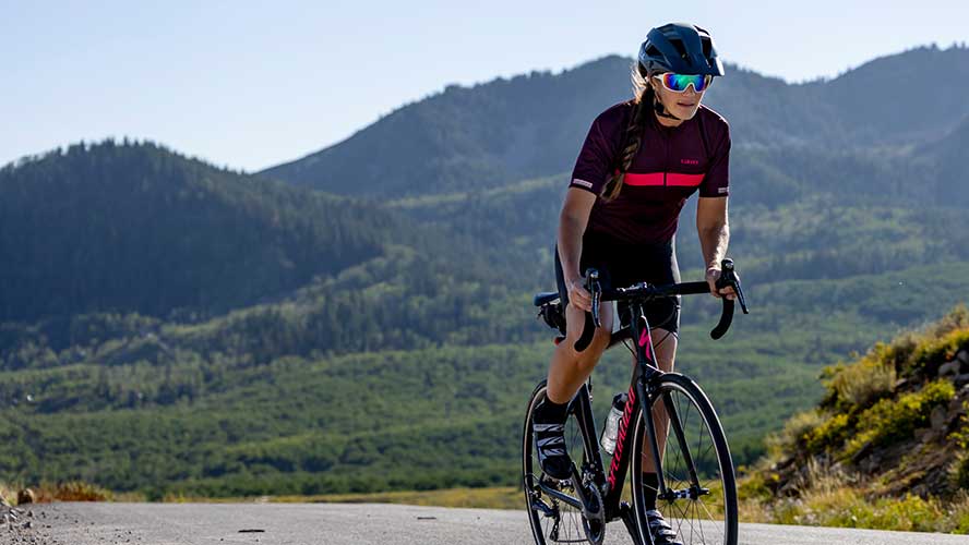 Jans Expert cycles up the hill sporting Giro cycling gear