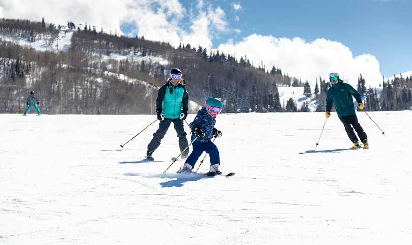 Jans Experts ski with their daughter at Park City's Mountain Village, Payday trail